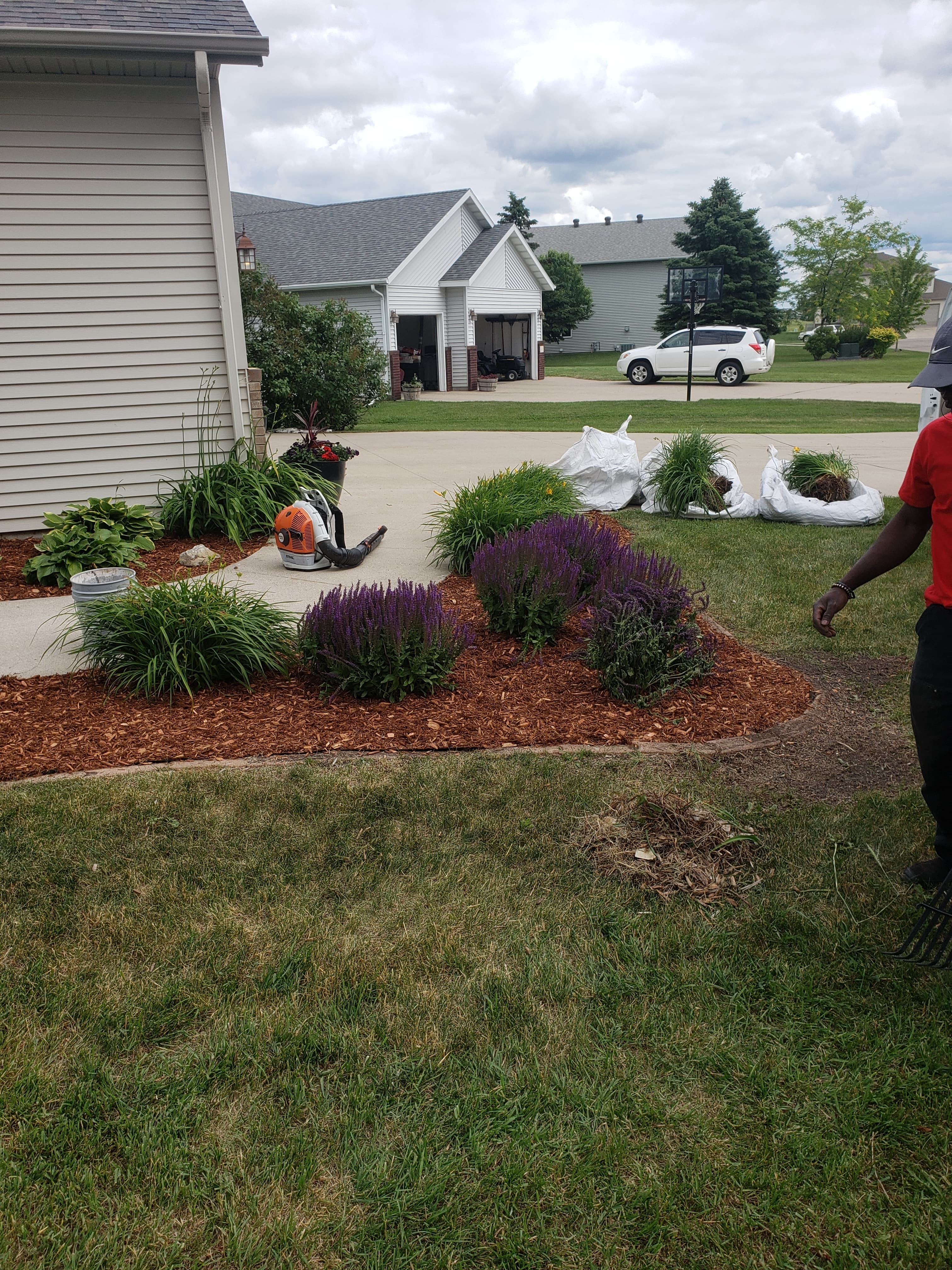 Landscaping crew planting project in Fargo ND