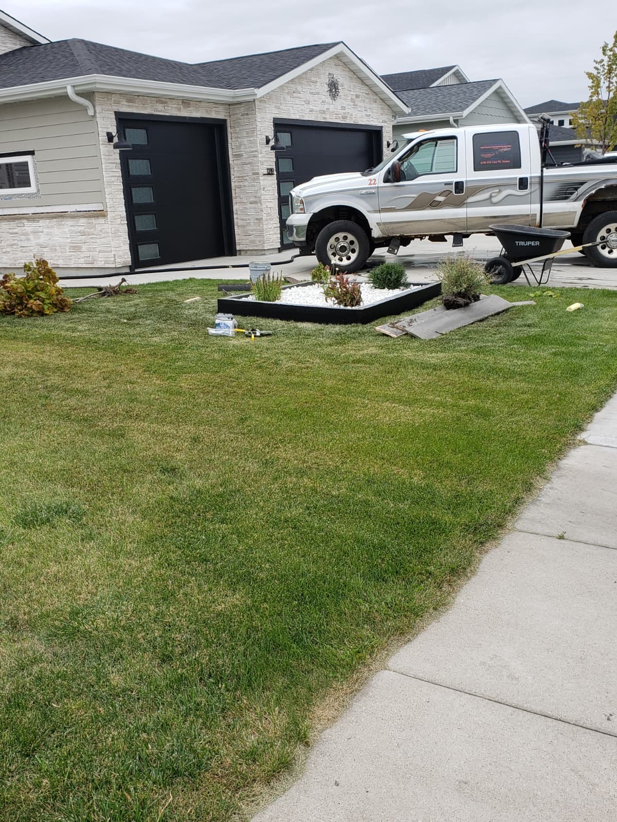 PK Landscaping crew working on residential property in Fargo ND