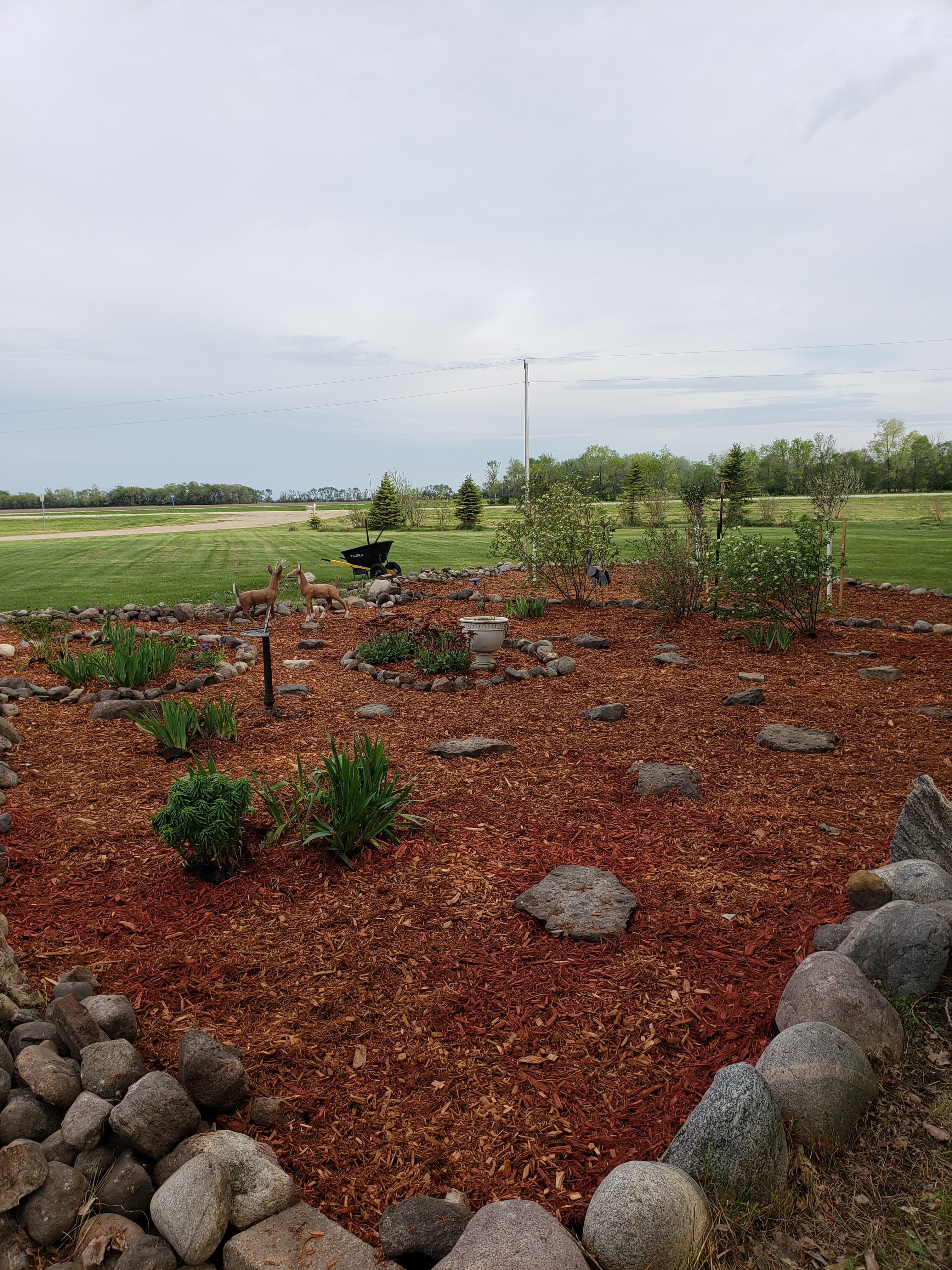 Mulch garden with rock border landscaping in Fargo ND
