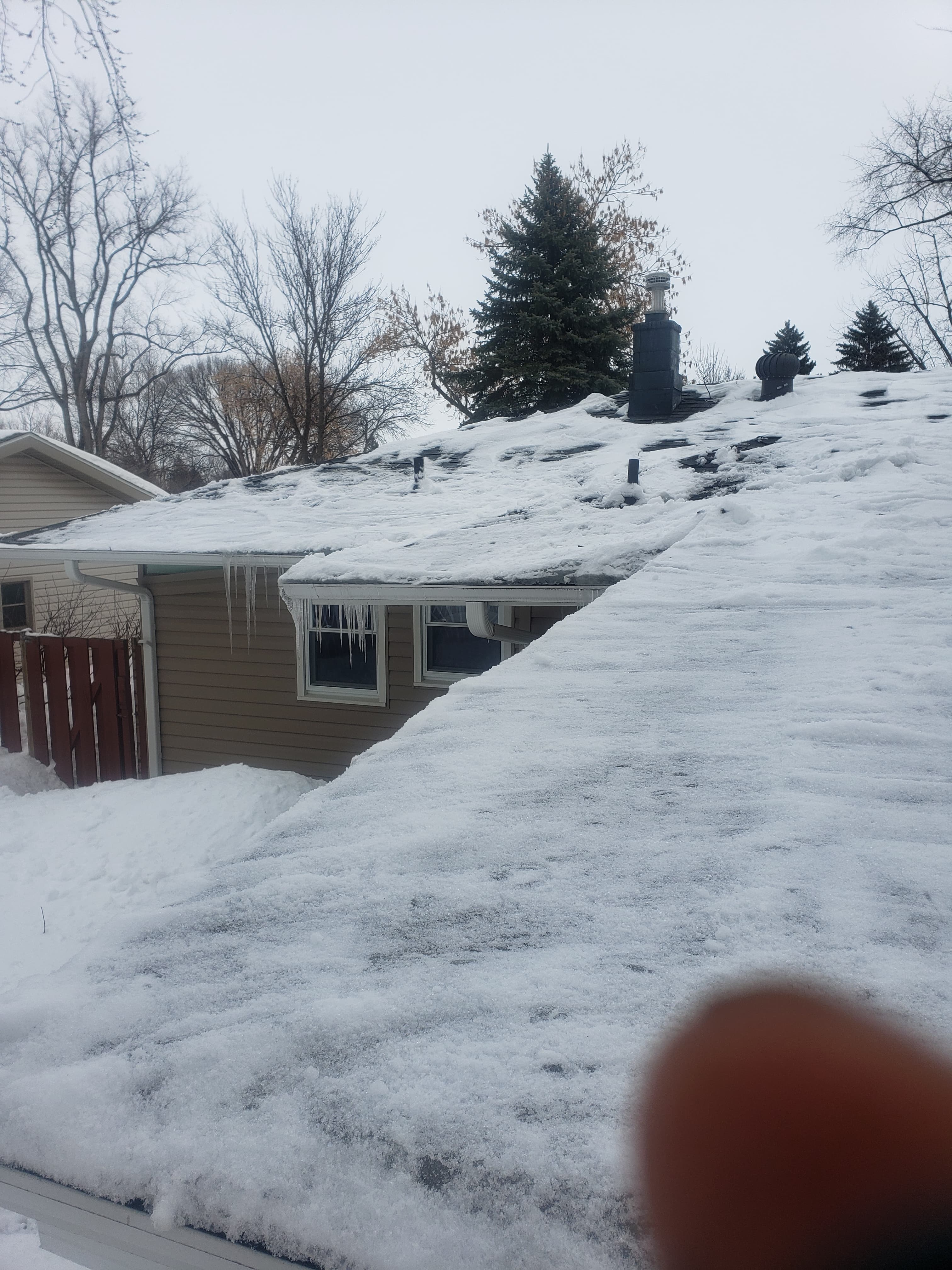 Winter roof snow and ice removal in Fargo ND