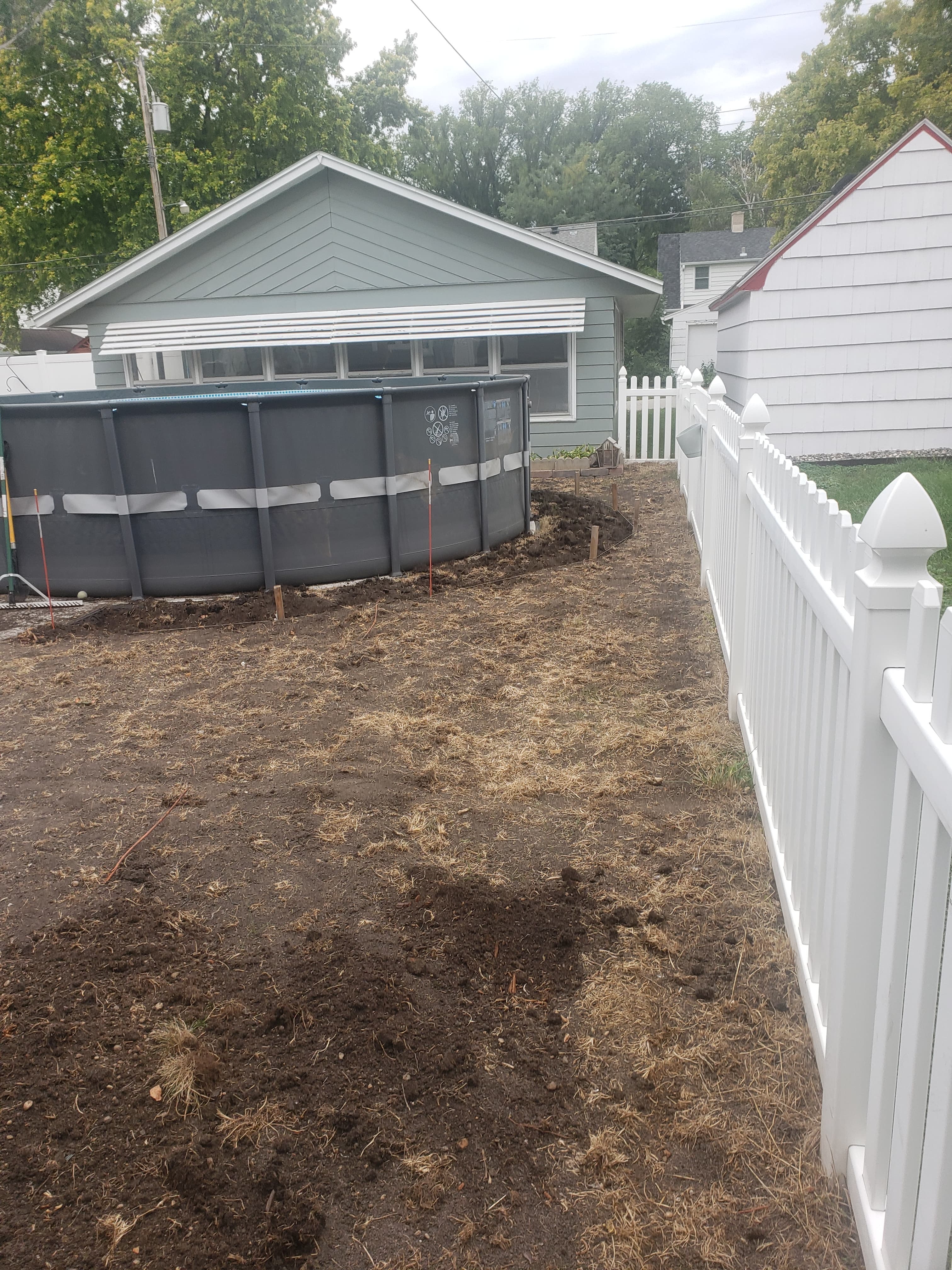 Bare dirt backyard before landscaping in Fargo ND
